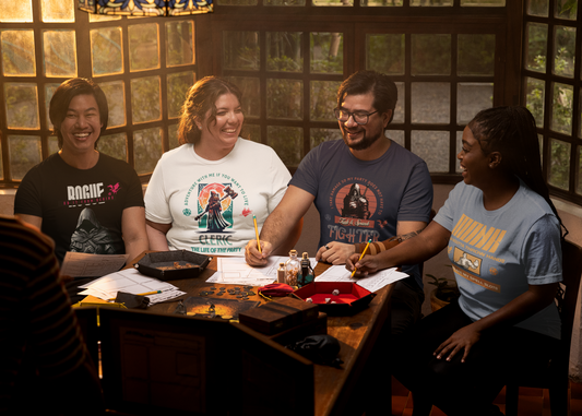 group of four friends playing tabletop roleplaying wearing fantasy character class t shirts