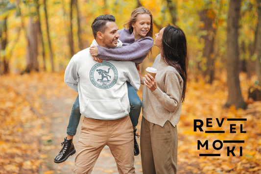 man with his family in the woods, wearing wrestling dad hoodie, white