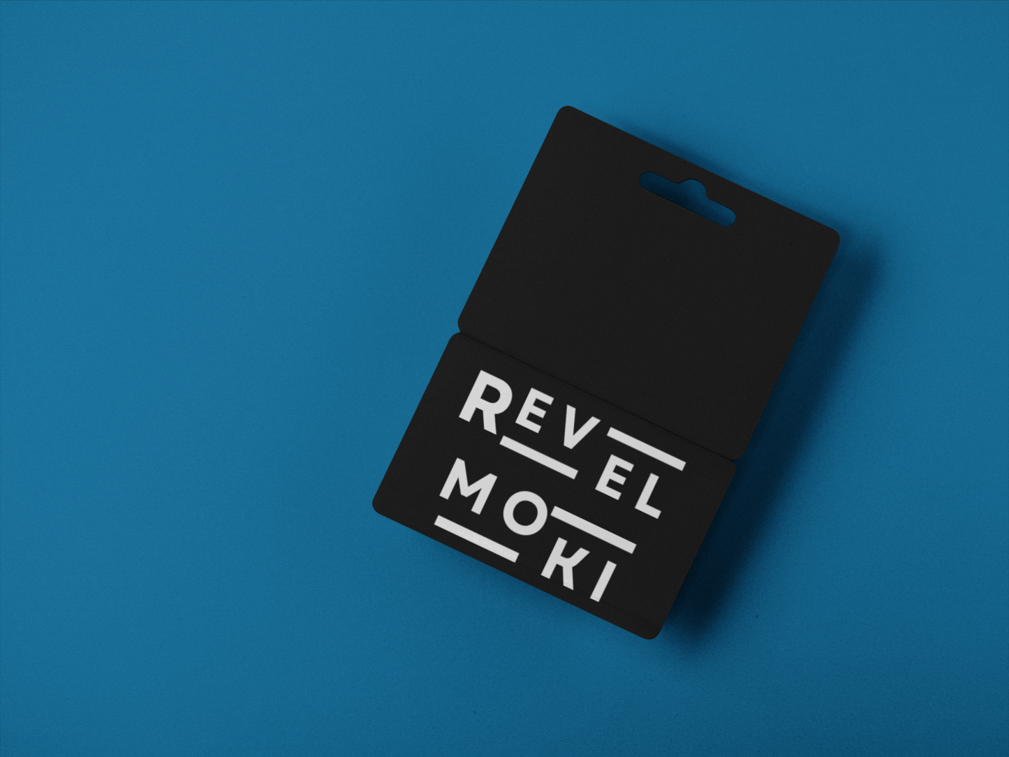 angled-gift-card-mockup-lying-on-a-solid-surface