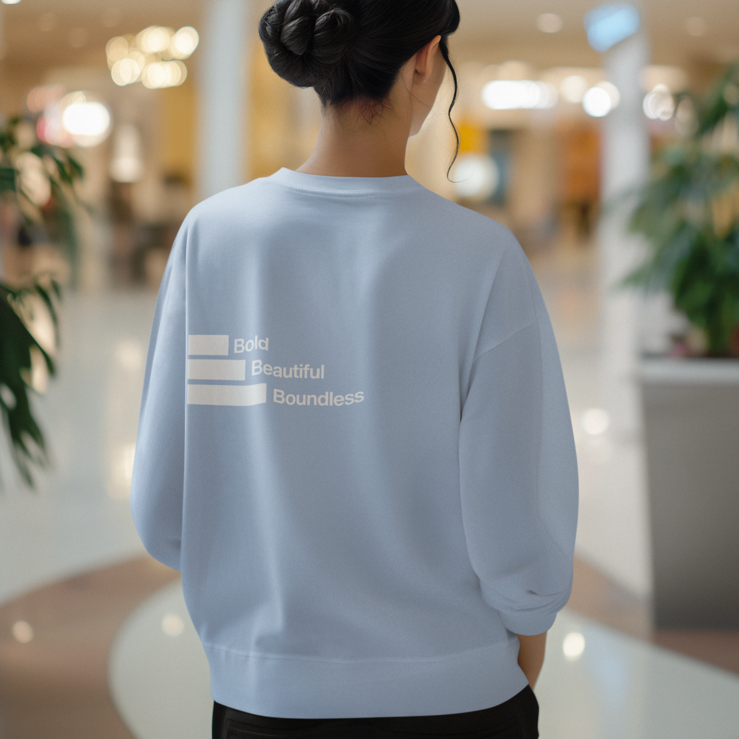 back-of-womans-boundless-light-blue-color-sweatshirt