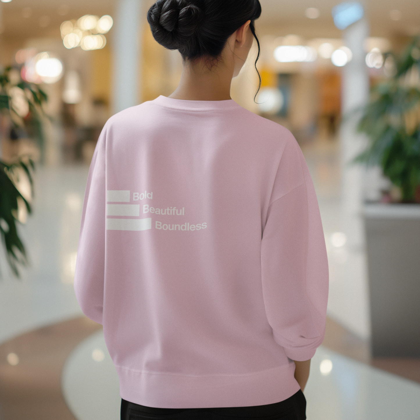 back-of-womans-boundless-pink-color-sweatshirt