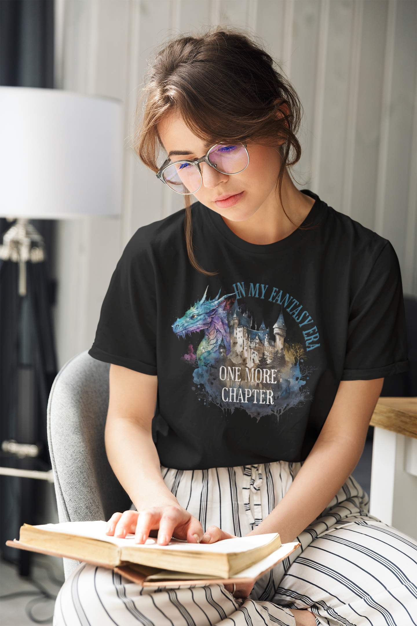 in-my-fantasy-era-woman-tee-of-a-woman-reading-at-home-black