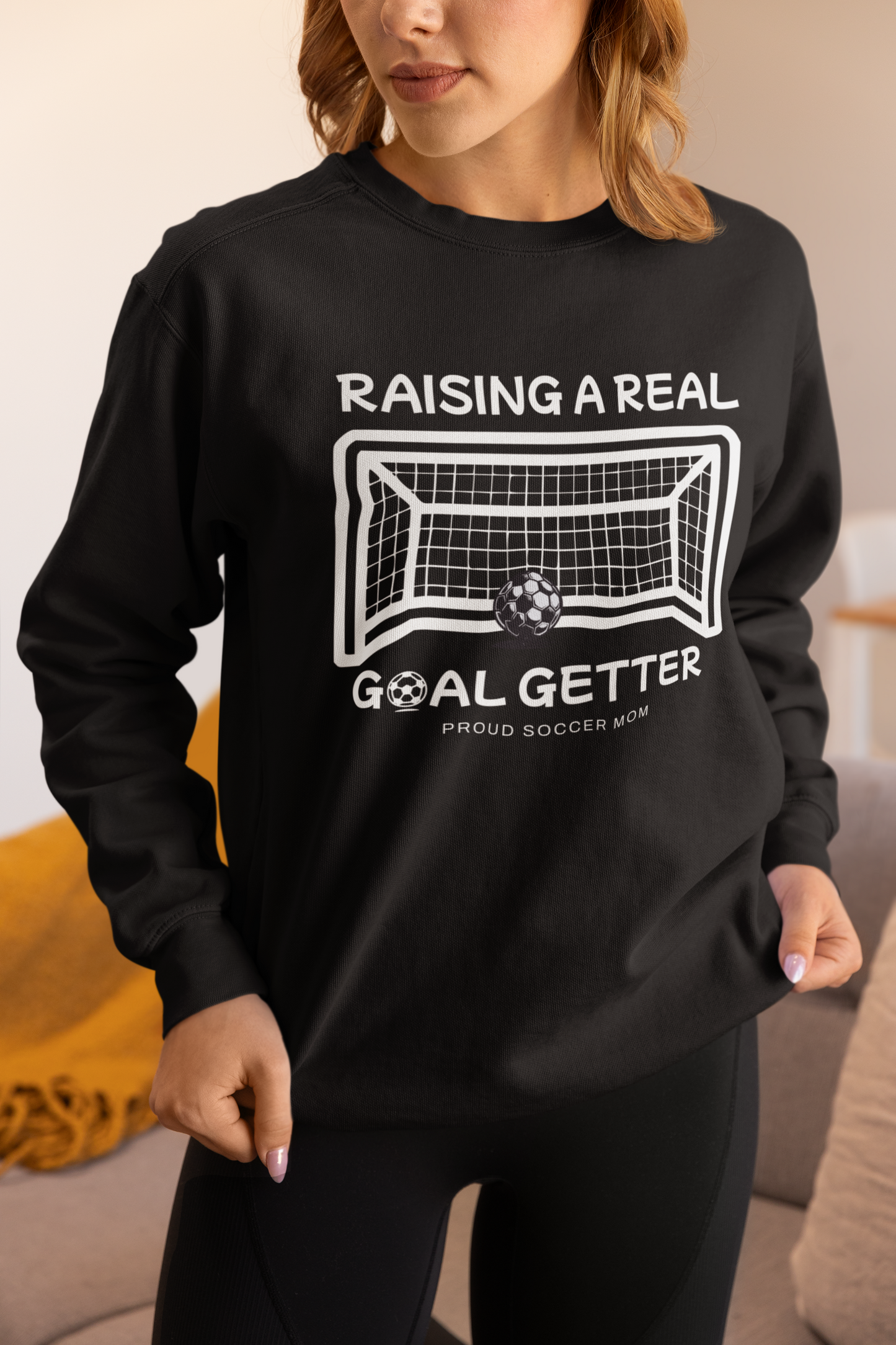 raising-a-real-goalgetter-soccer-mom-sweatshirt-black