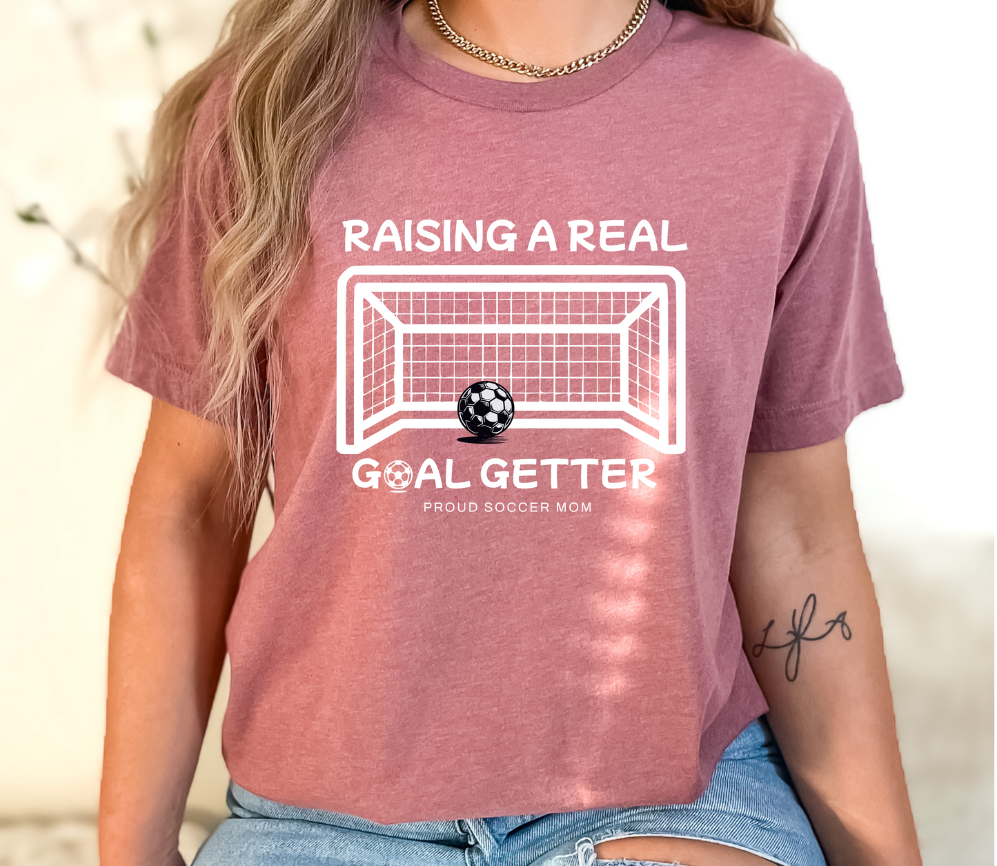 raising-a-real-goalgetter-soccer-mom-tee-heather-mauve