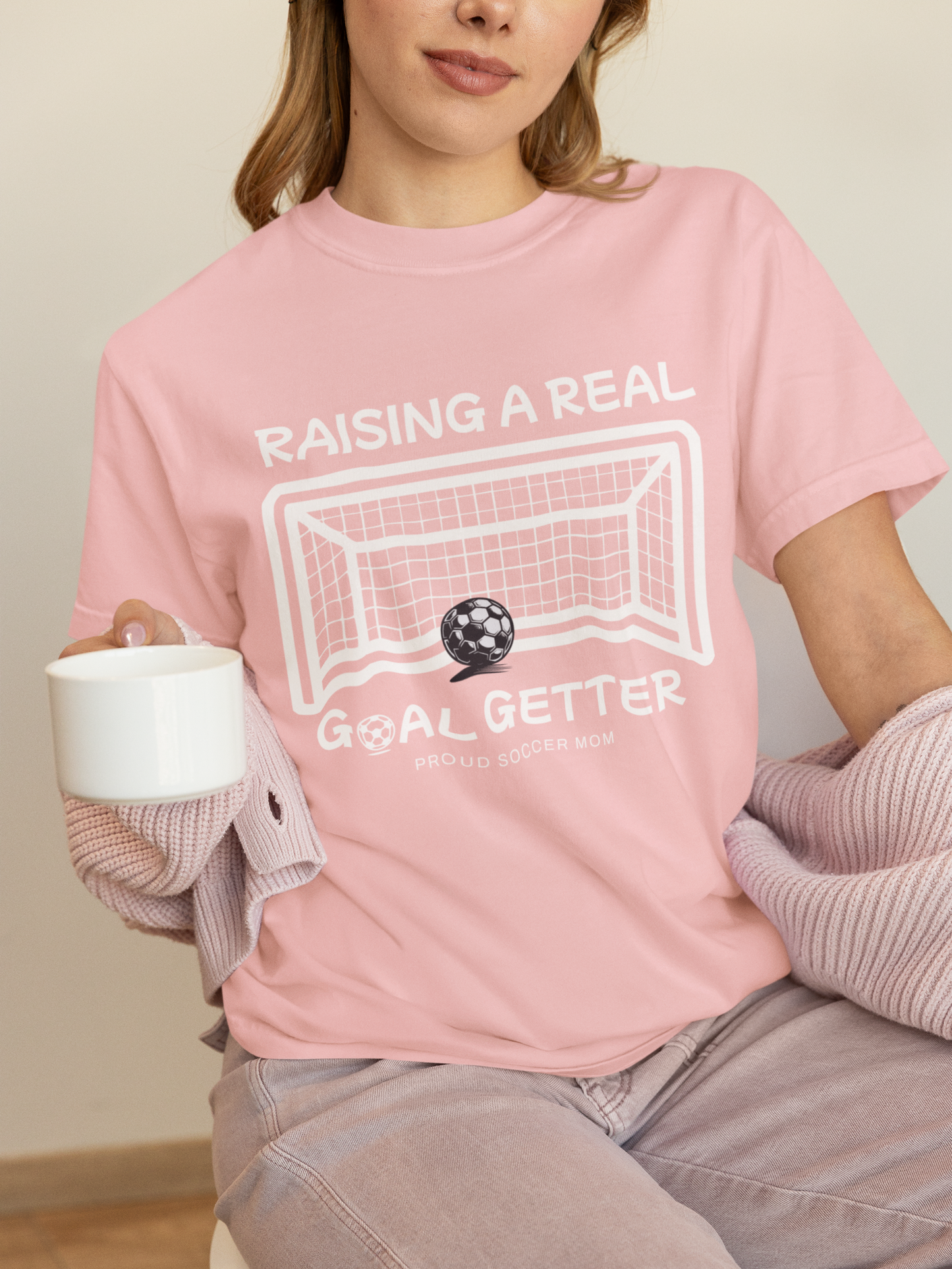 raising-a-real-goalgetter-soccer-mom-tee-pink