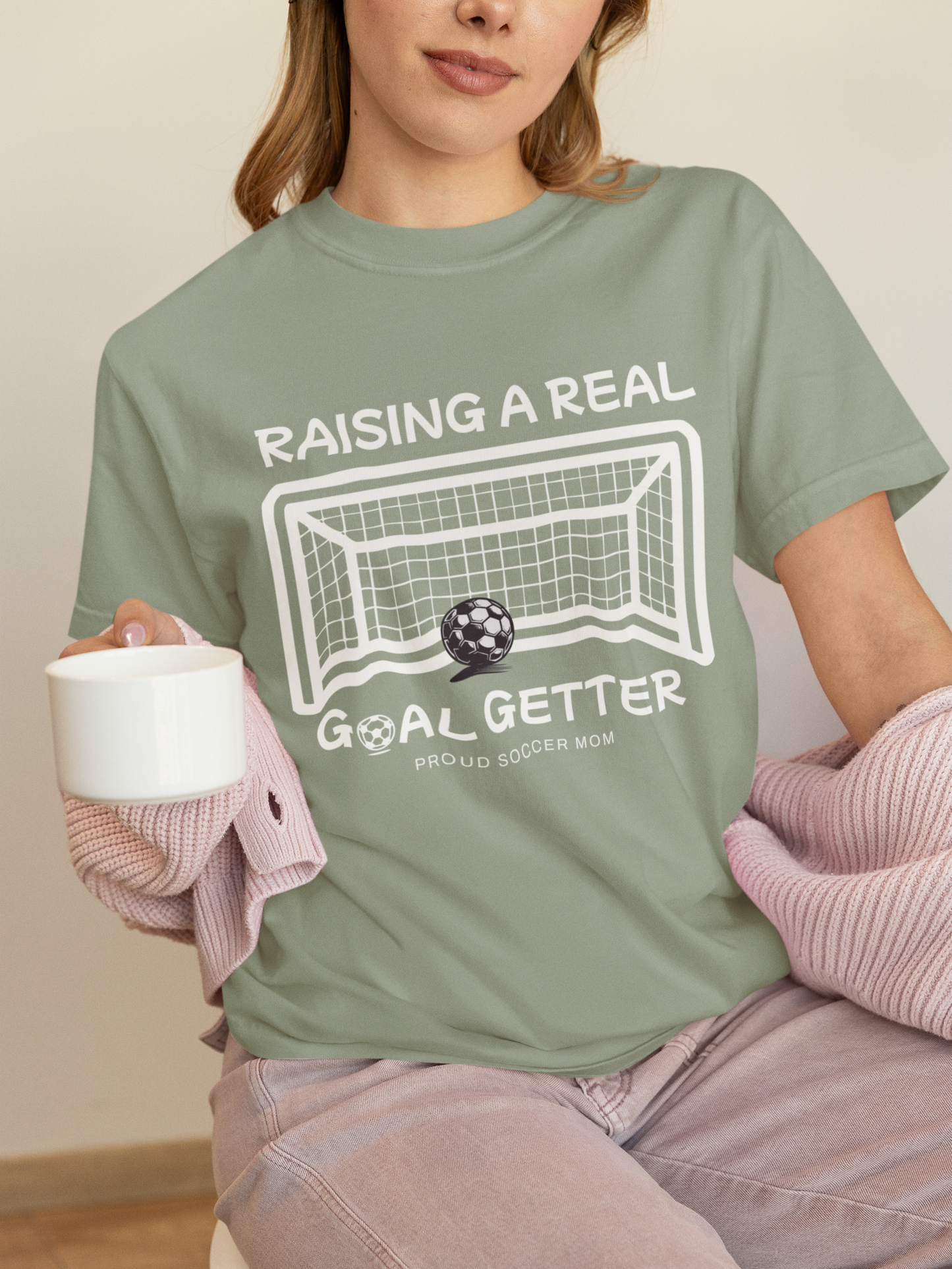 raising-a-real-goalgetter-soccer-mom-tee-sage