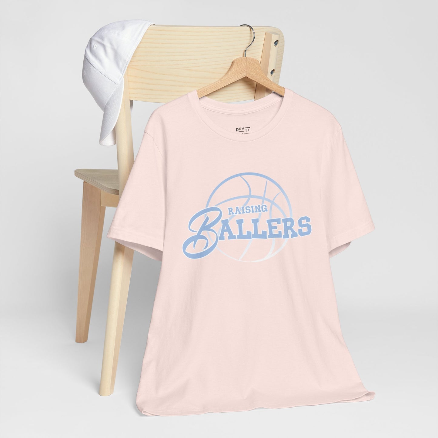raising-ballers-basketball-dad-tshirt-closeup-softpink