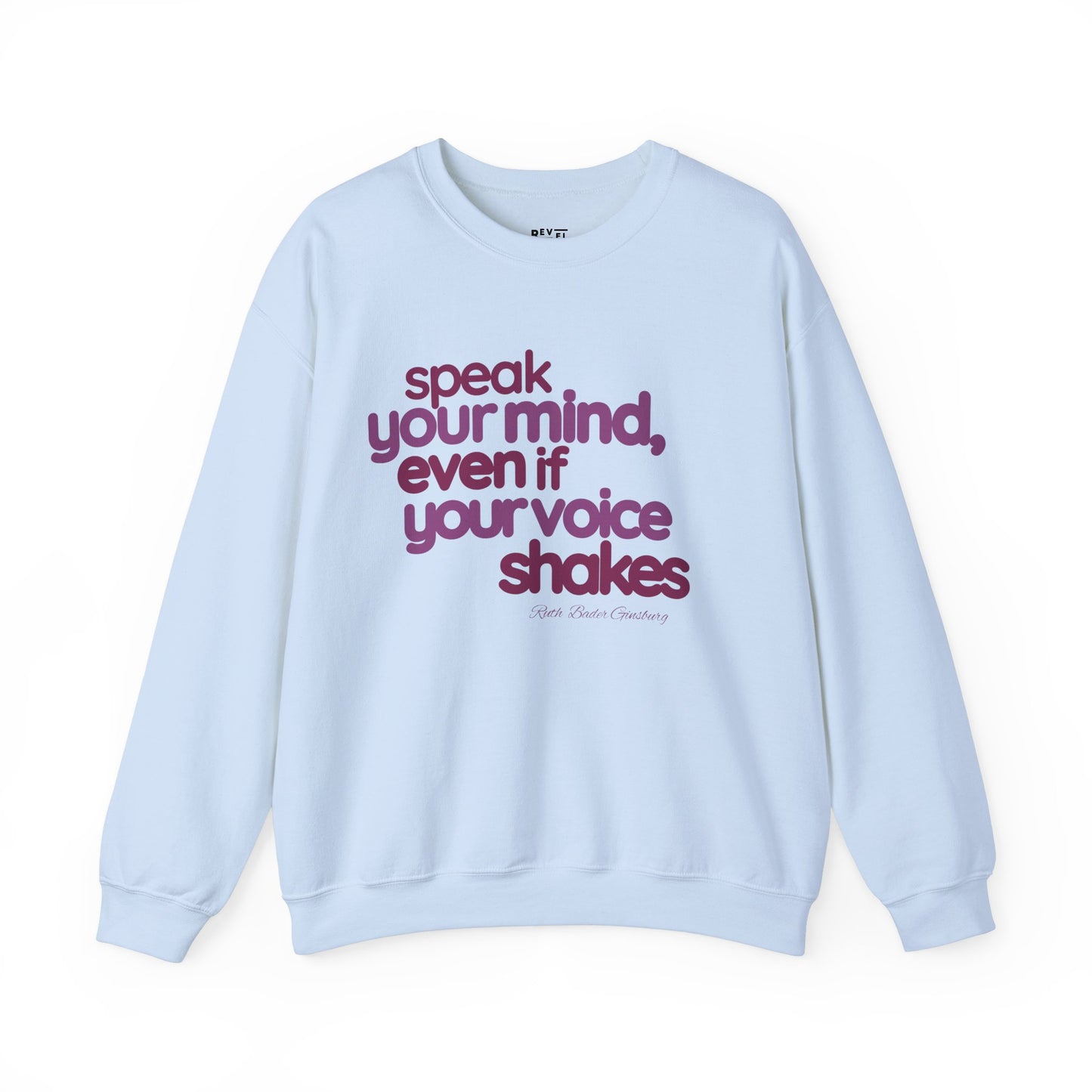 short-haired-woman-pulling-down-her-sweatshirt-wearing-women-empoowerment-shirt-closeup-blue