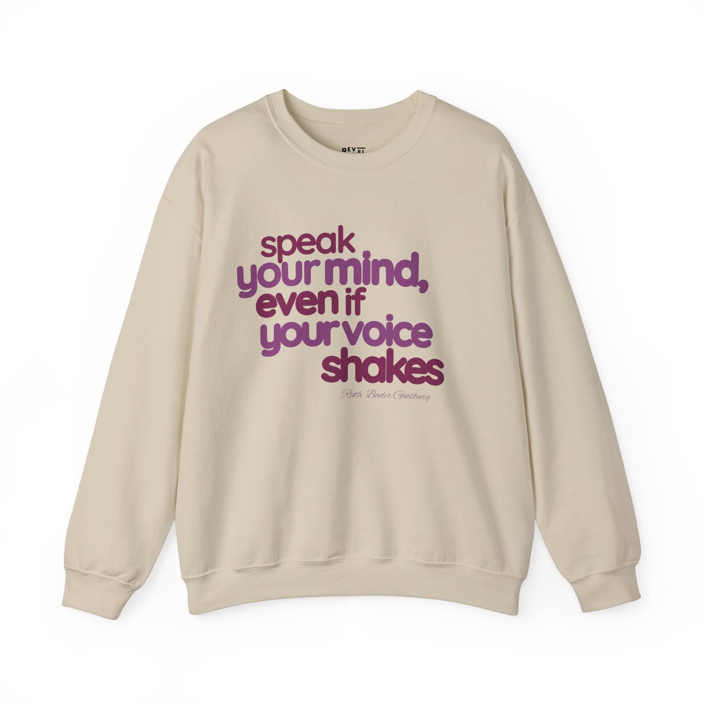 short-haired-woman-pulling-down-her-sweatshirt-wearing-women-empoowerment-shirt-closeup-sand