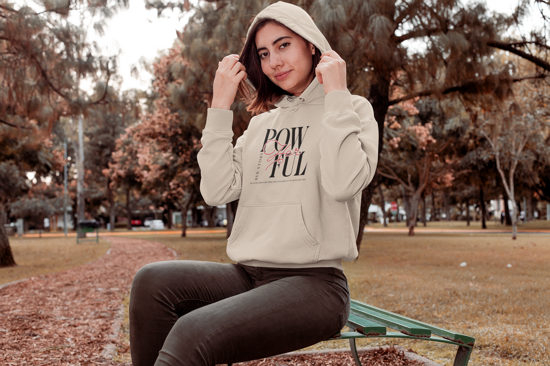 woman wearing women empowerement hoodie, color light brown