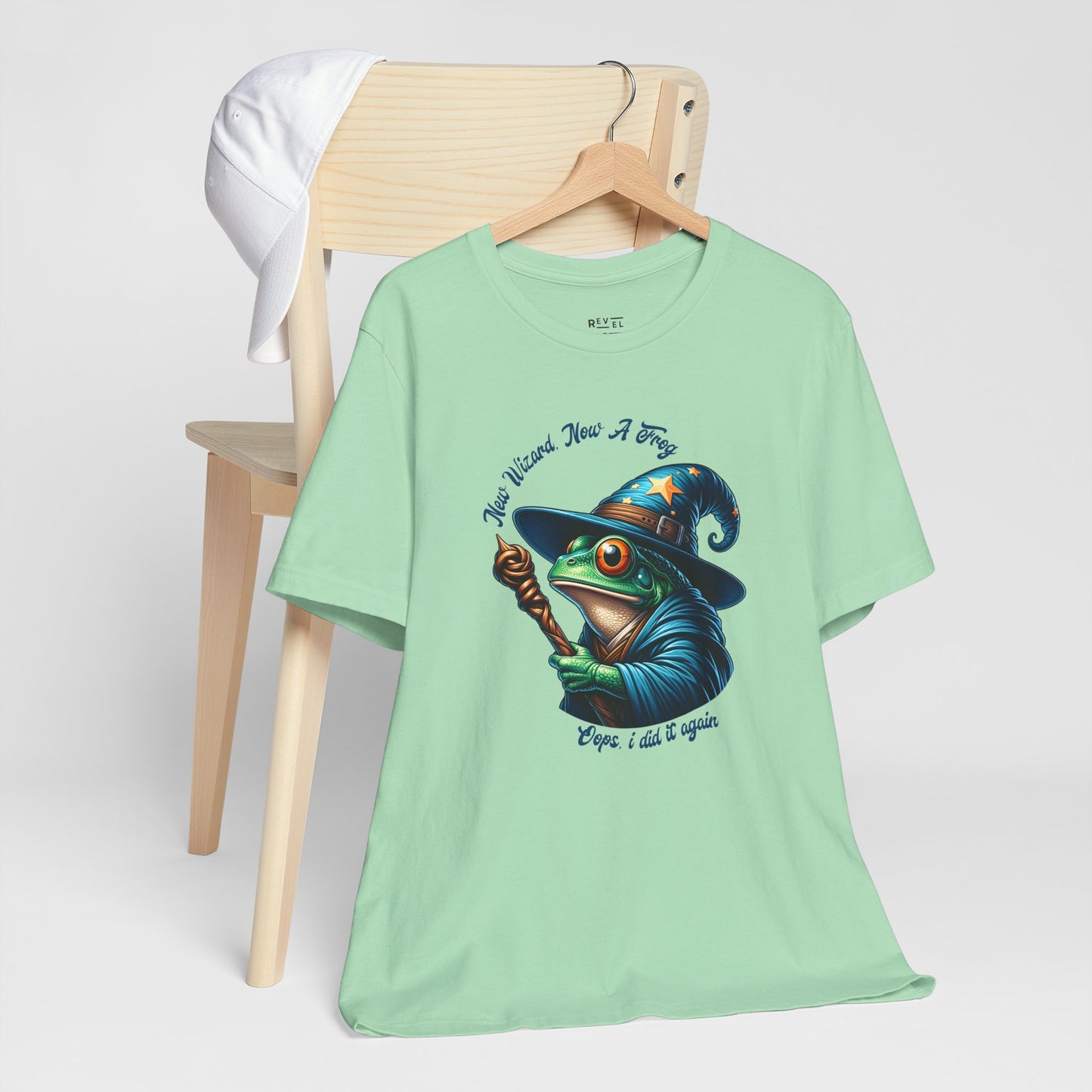 green-t-shirt-with-a-graphic-of-a-frog-in-a-wizard-hat.