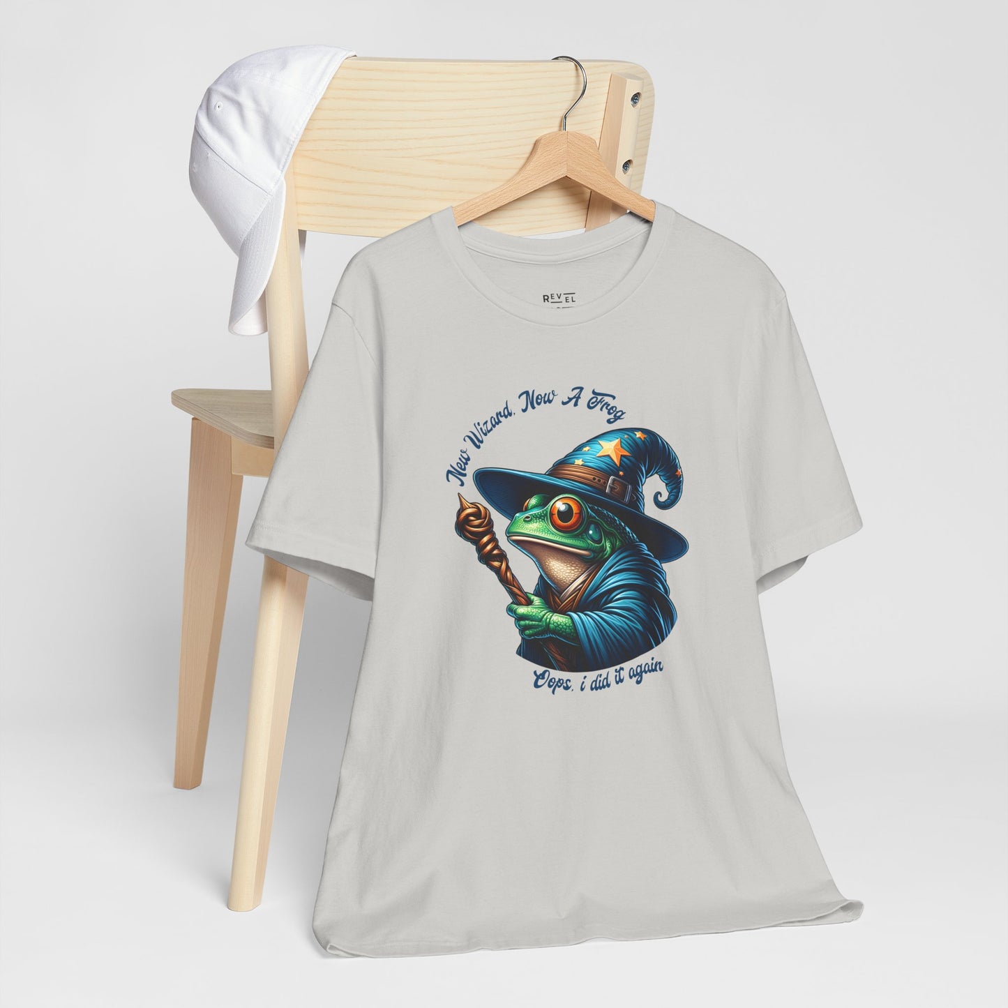 silver-t-shirt-with-a-graphic-of-a-frog-in-a-wizard-hat.