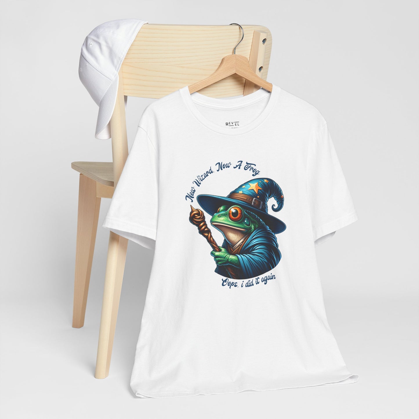 white-t-shirt-with-a-graphic-of-a-frog-in-a-wizard-hat.