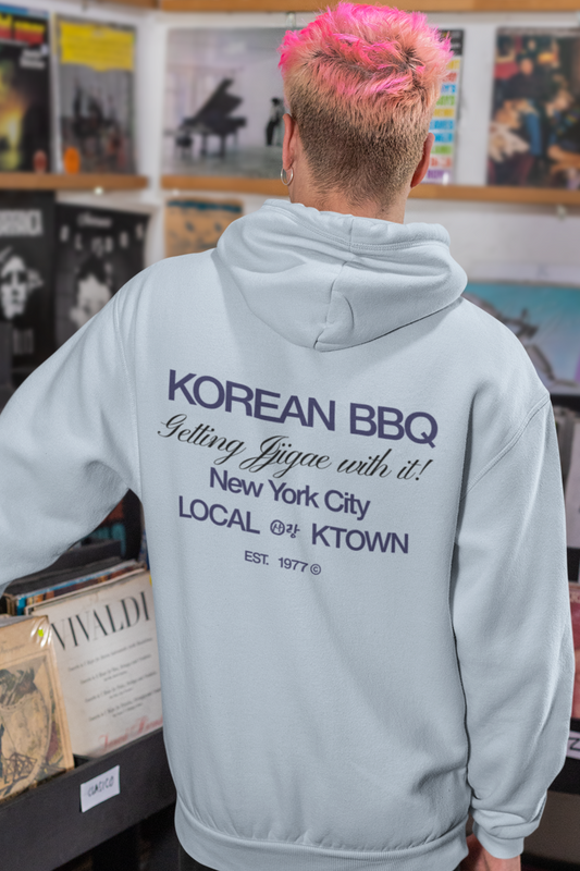 asian-man-wearing-korean-barbecue-hoodie-back-light-blue