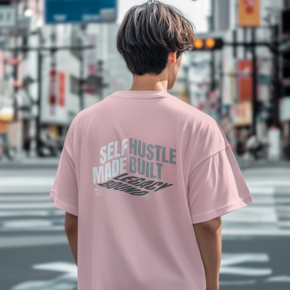 person-wearing-t-shirt-back-of-tee-that-says-self-made-hustle-built-legacy-bound-color-sunset