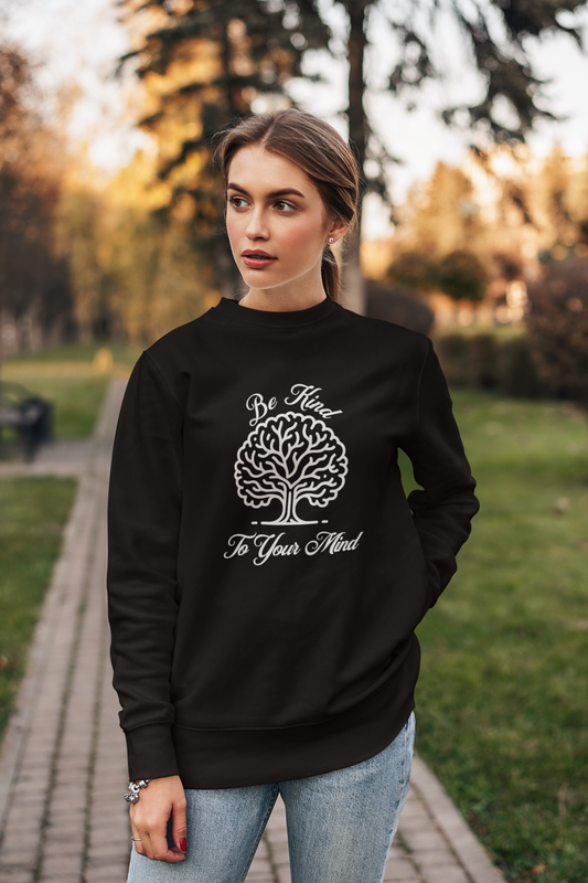 crewneck-sweatshirt-of-a-serious-woman-posing-in-a-garden-wearing-be-kind-to-your-mind-shirt-black