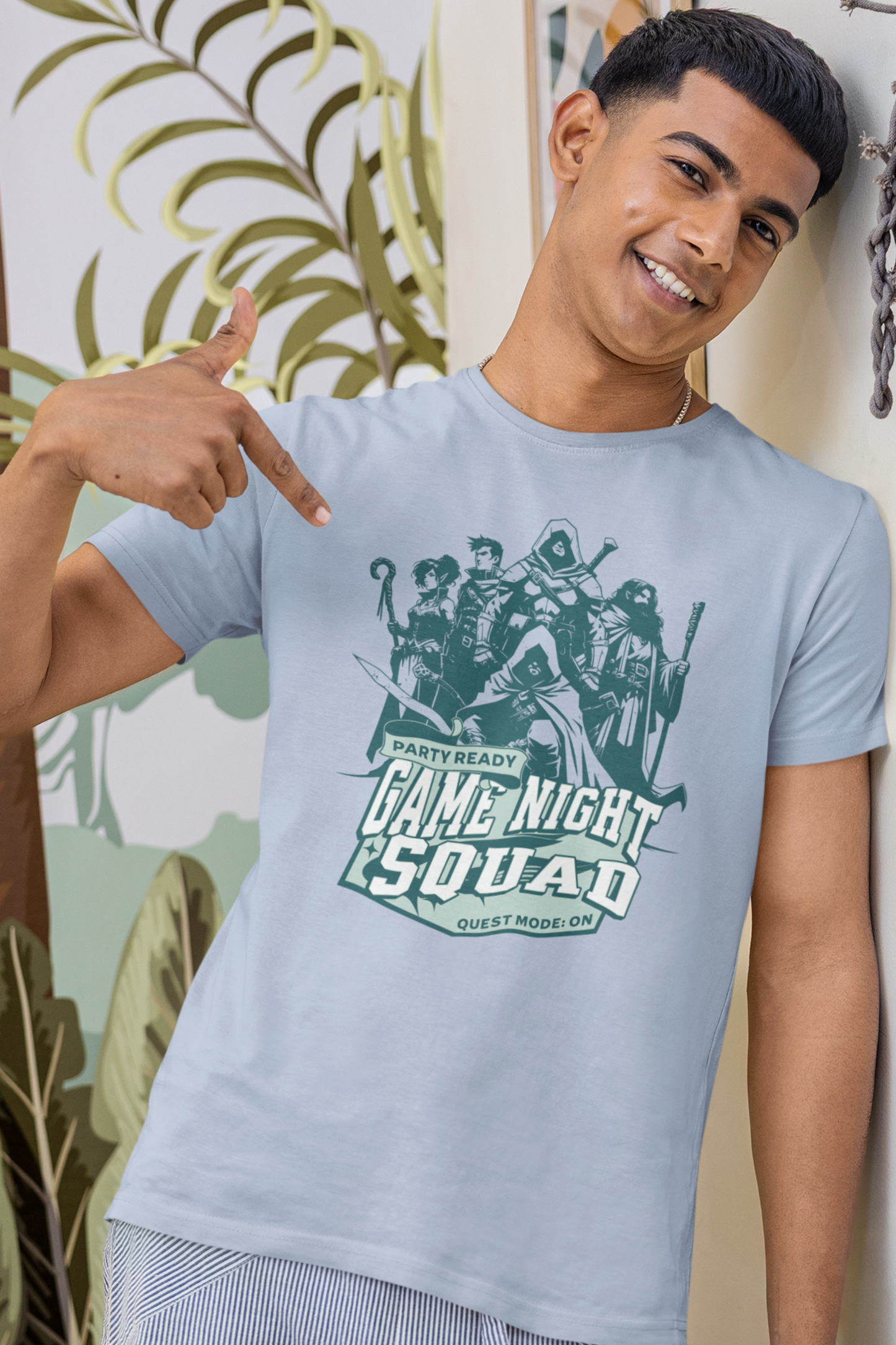 Person-wearing-a-t-shirt-with-'Game-Night-Squad'-graphic-design-color-blue