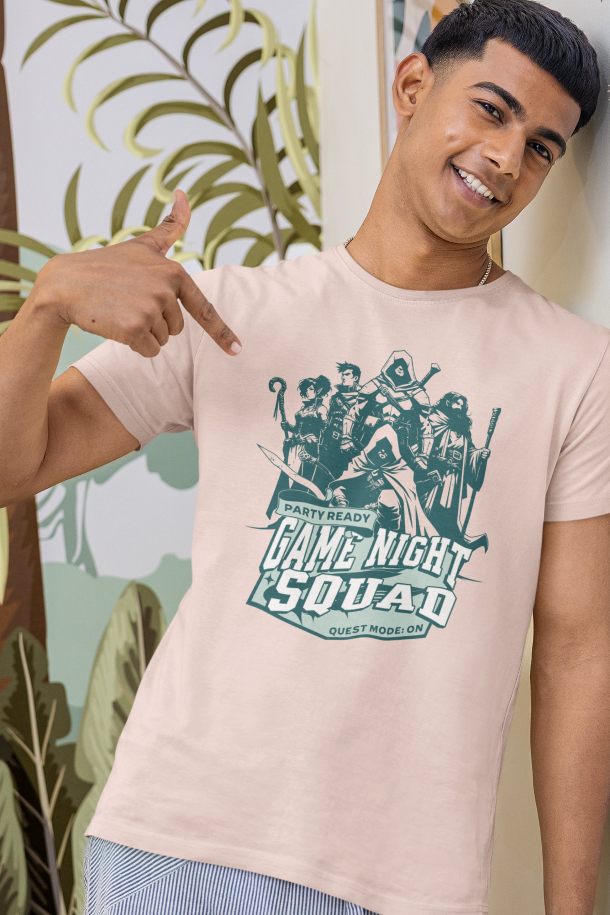Person-wearing-a-t-shirt-with-'Game-Night-Squad'-graphic-design-color-soft-pink