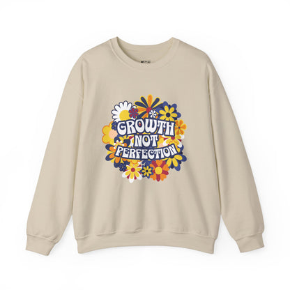 growth-not-perfection-woman-sweatshirt-closeup-sand