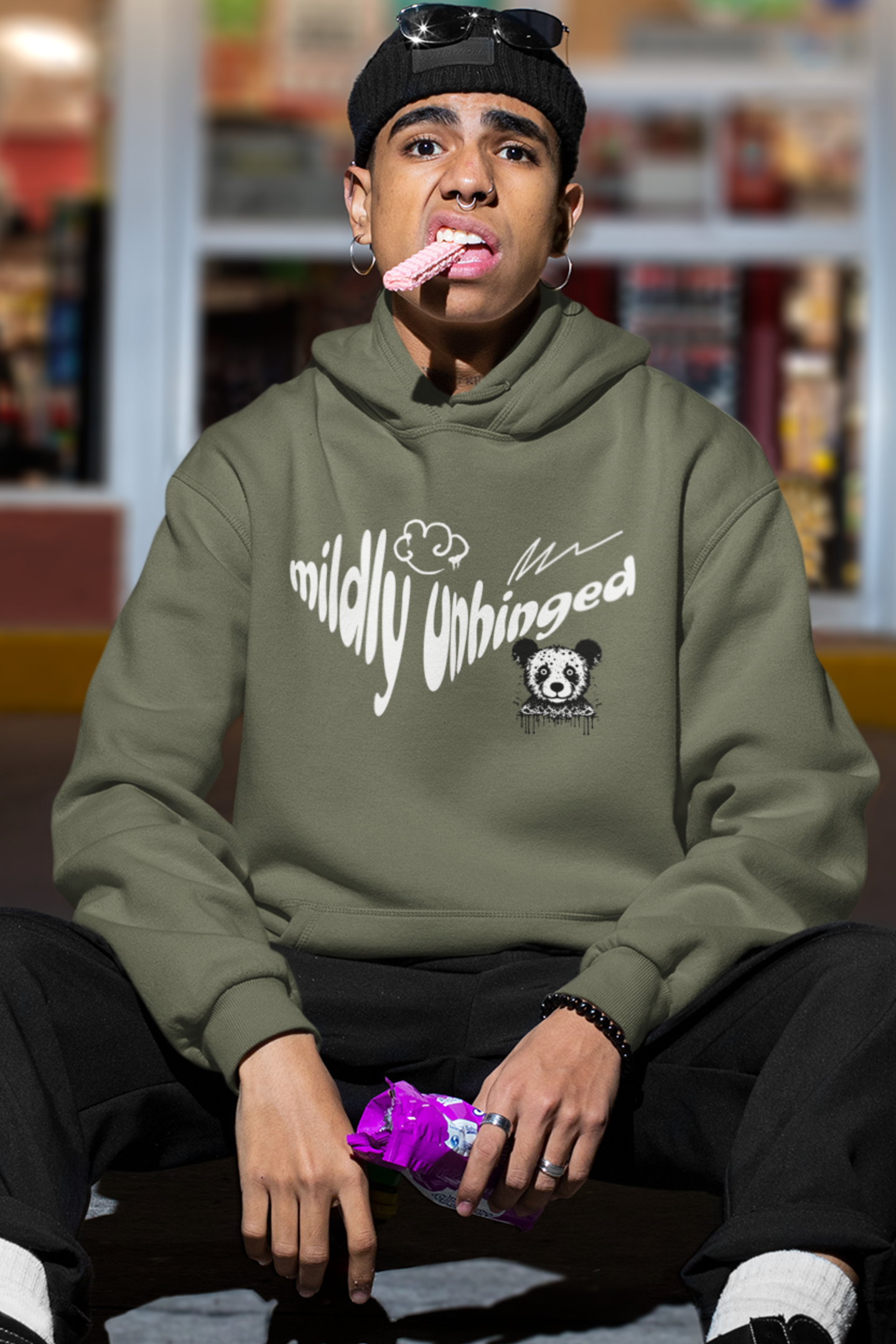 man-wearing-funny-hoodie-that-says-mildly-unhinged-green