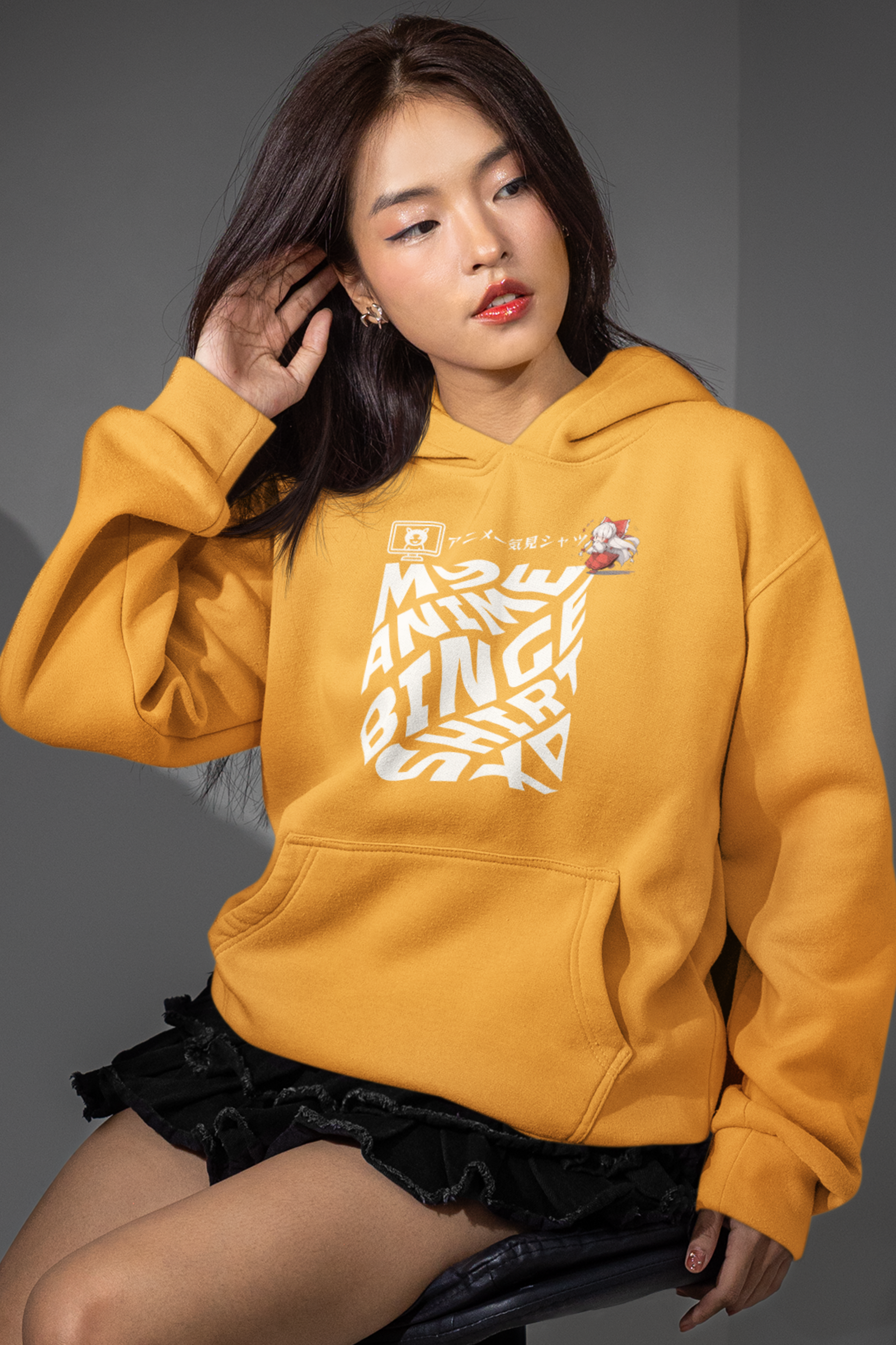 person-weaering-anime-binge-graphic-hoodie=color-yellow