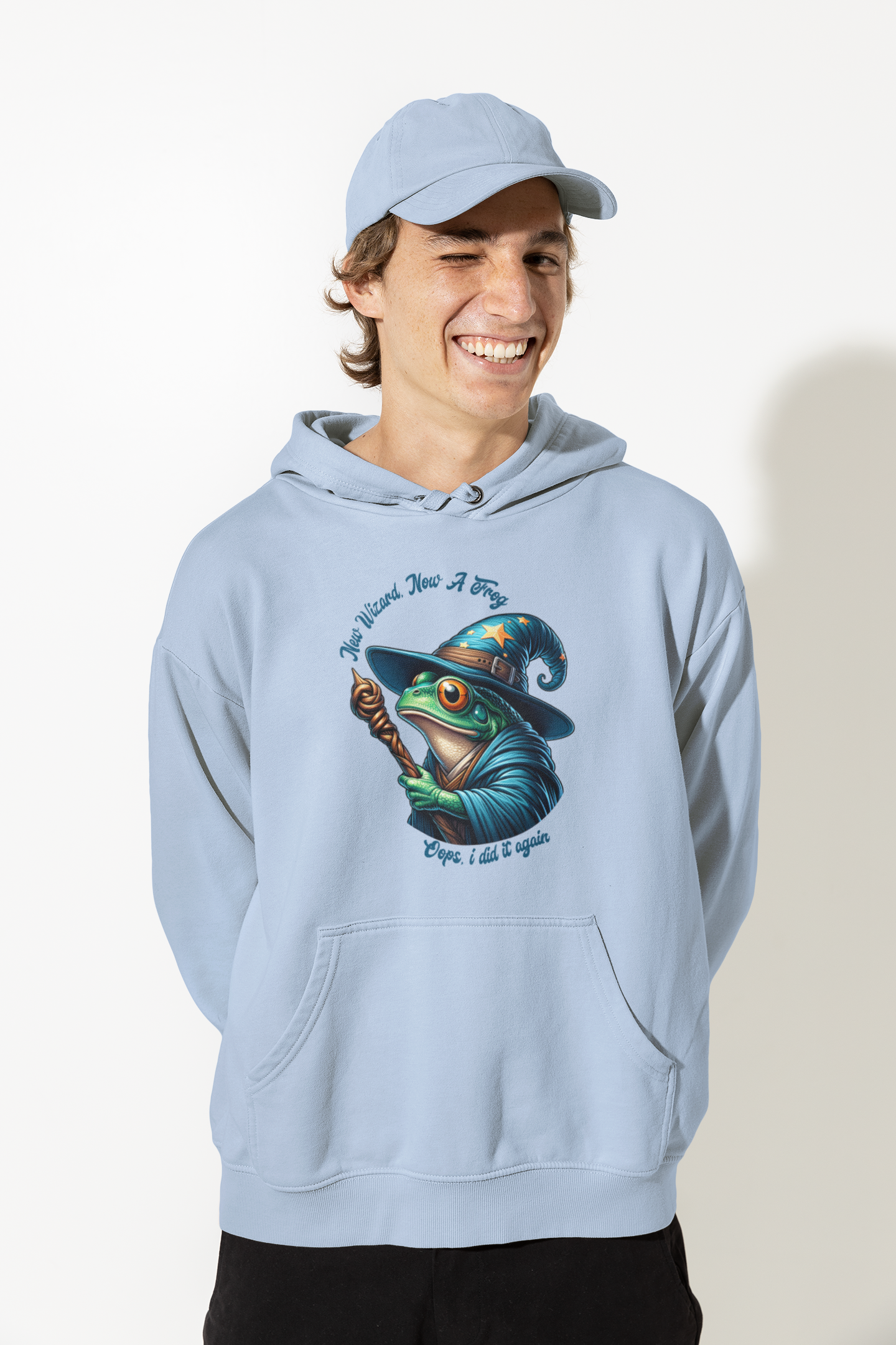 Person-wearing-a-hoodie-with-a-frog-with-wizard-hat-graphic-design-color-blue