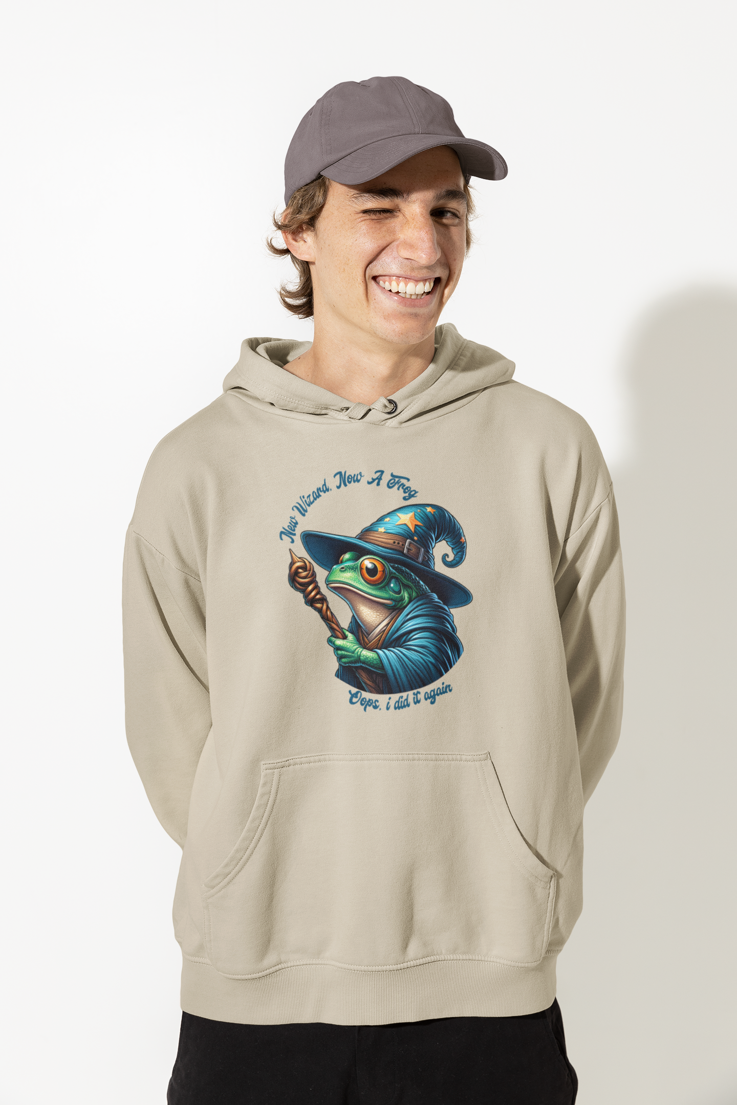 Person-wearing-a-hoodie-with-a-frog-with-wizard-hat-graphic-design-color-sand