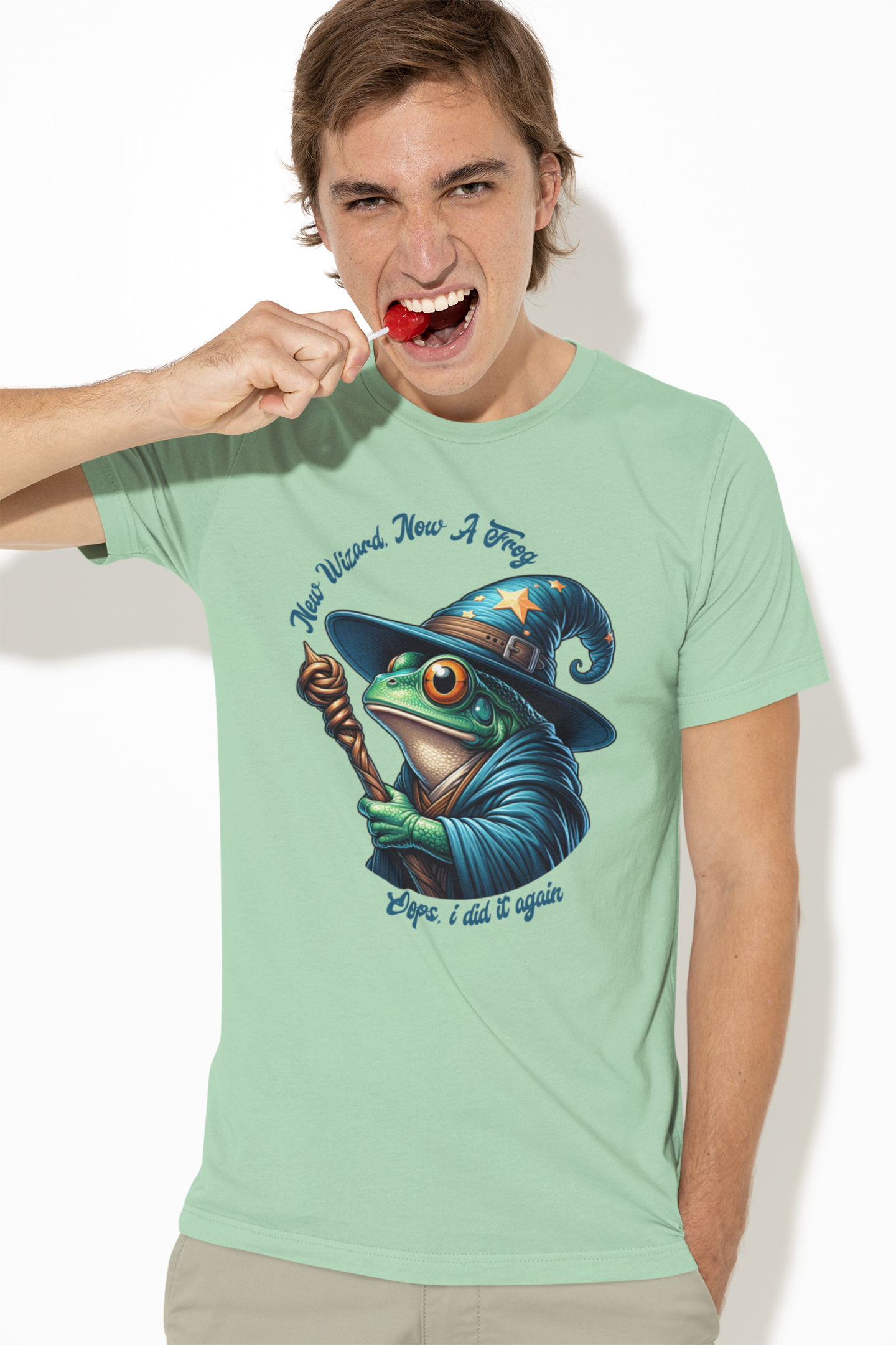 Person-wearing-a-green-t-shirt-with-a-graphic-of-a-frog-in-a-wizard-hat-and-holding-a-cane.