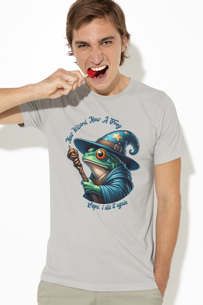 Person-wearing-a-silver-t-shirt-with-a-graphic-of-a-frog-in-a-wizard-hat-and-holding-a-cane.
