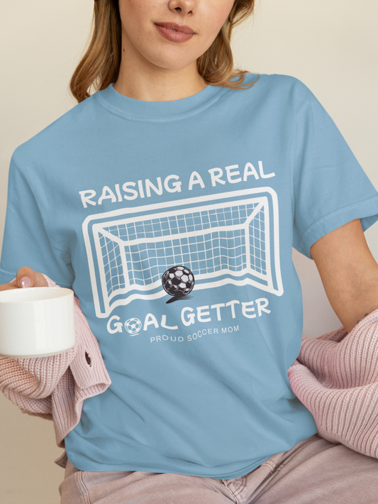 raising-a-real-goalgetter-soccer-mom-tee-baby-blue