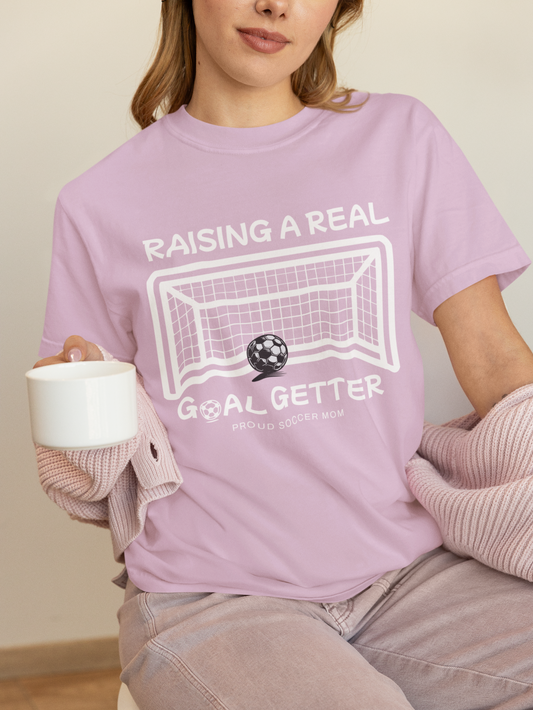 raising-a-real-goalgetter-soccer-mom-tee-lilac