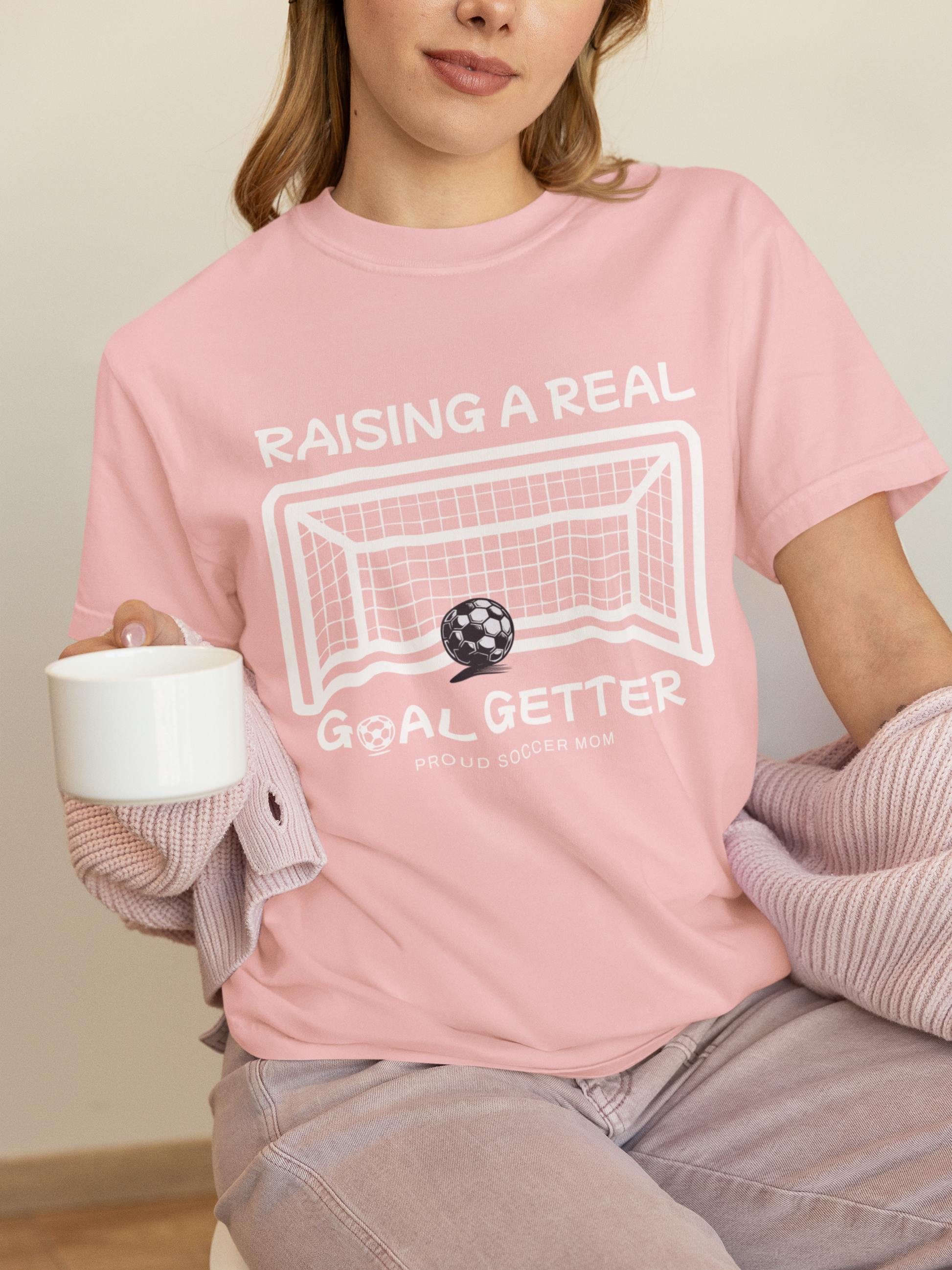 raising-a-real-goalgetter-soccer-mom-tee-pink