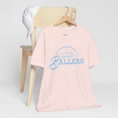 raising-ballers-basketball-dad-tshirt-closeup-softpink