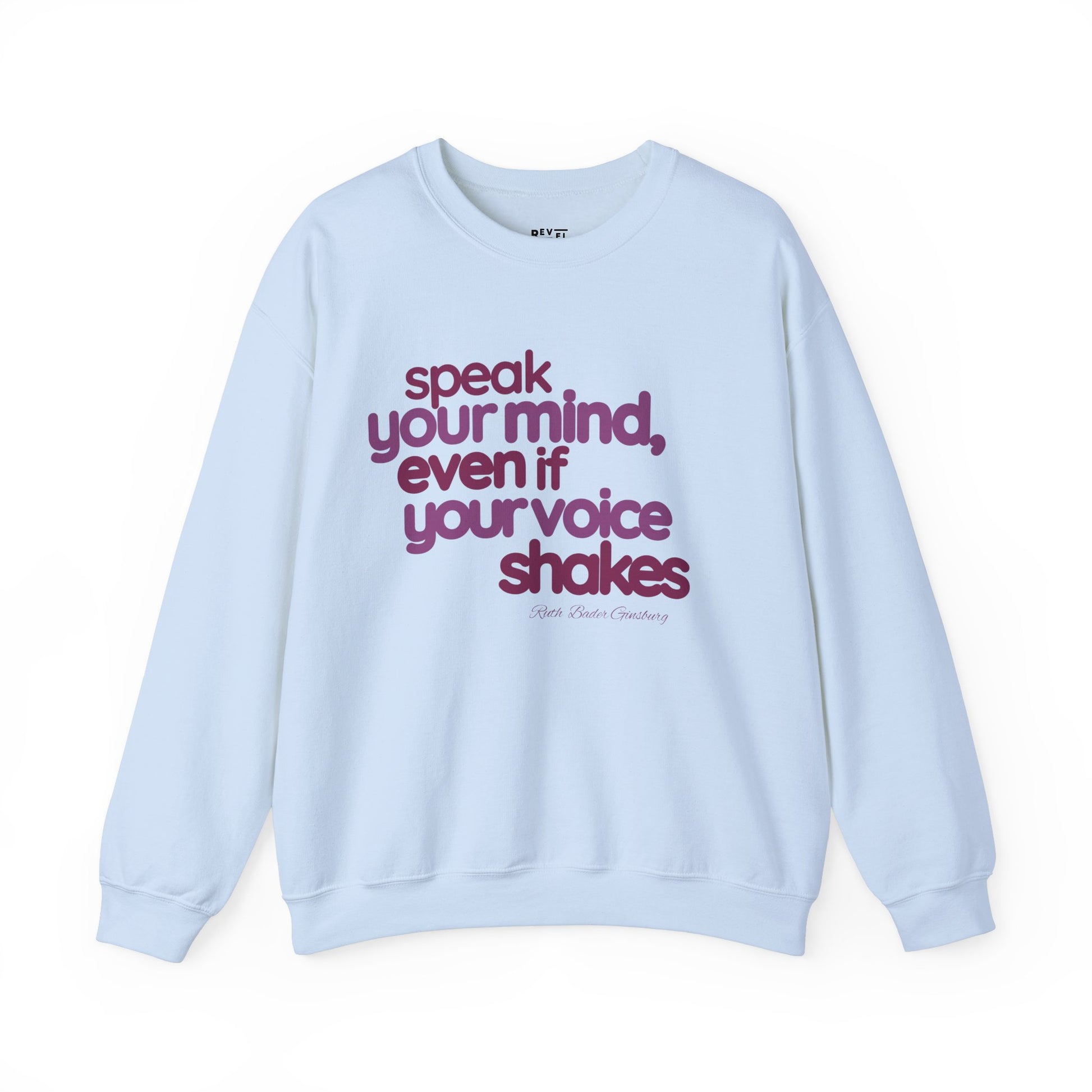 short-haired-woman-pulling-down-her-sweatshirt-wearing-women-empoowerment-shirt-closeup-blue