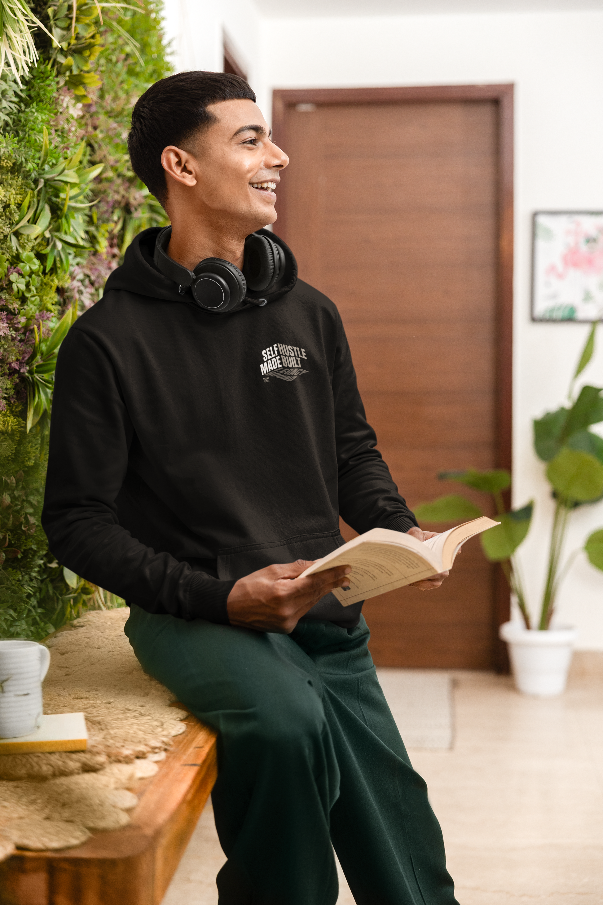person-wearing-front-of-hoodie-says-self--made-hustle-built-legacy-bound-color-black