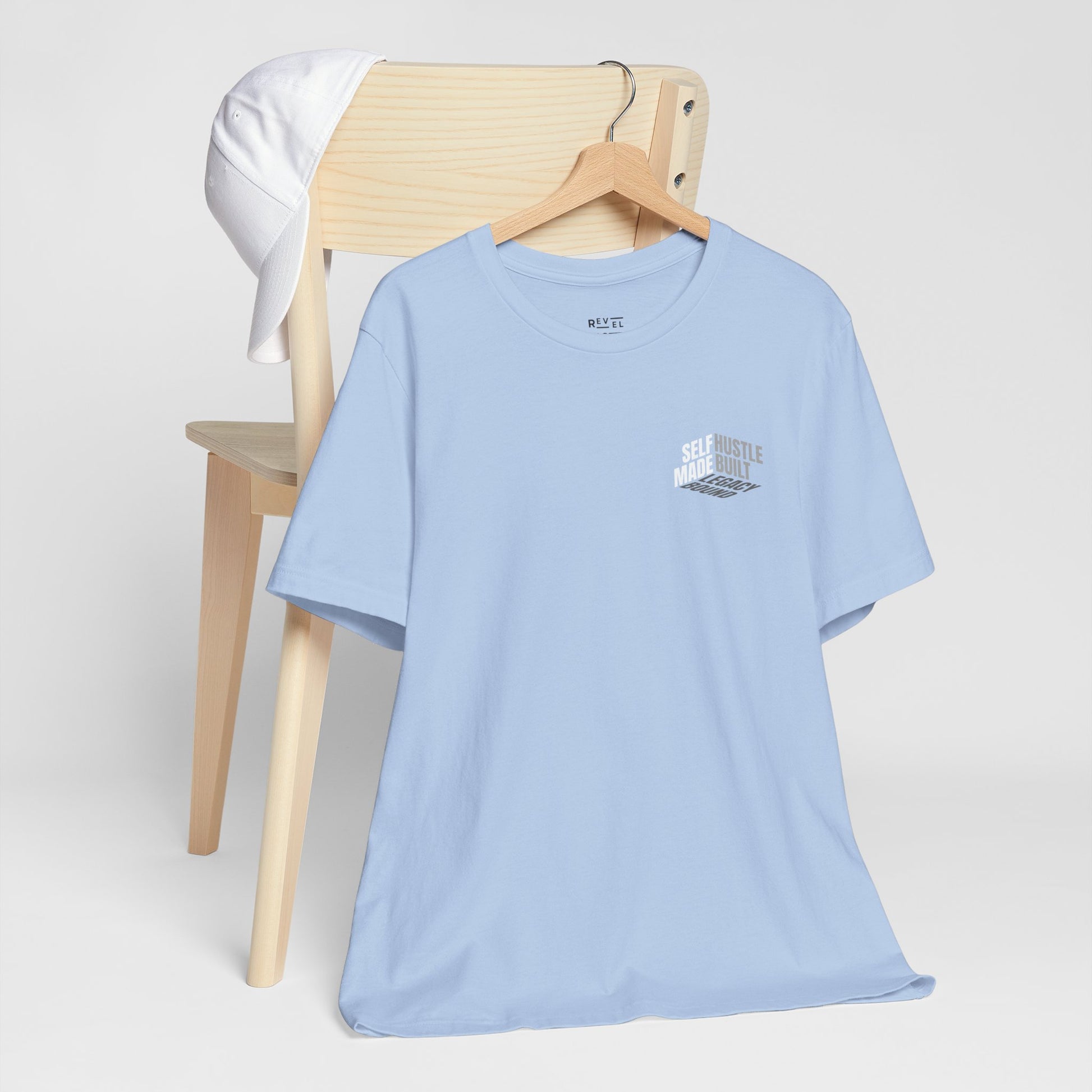 front-of-tee-that-says-self-made-hustle-built-legacy-bound-color-blue