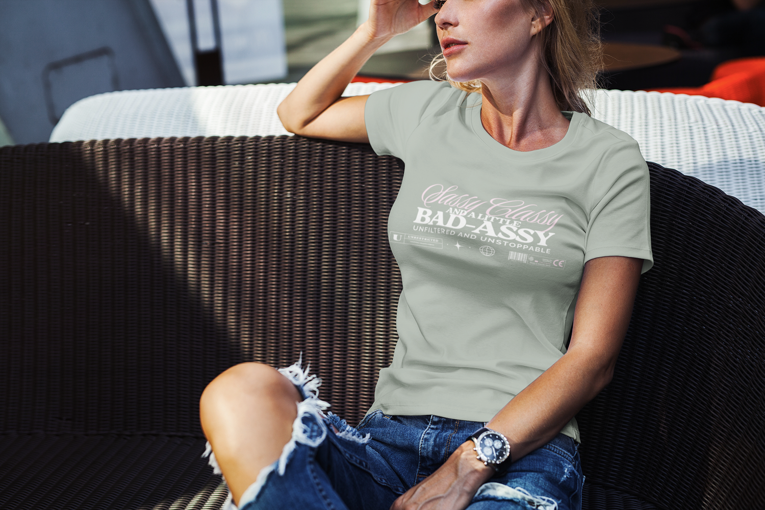 t-shirt-mockup-of-a-stylish-woman-sitting-in-the-sunlight