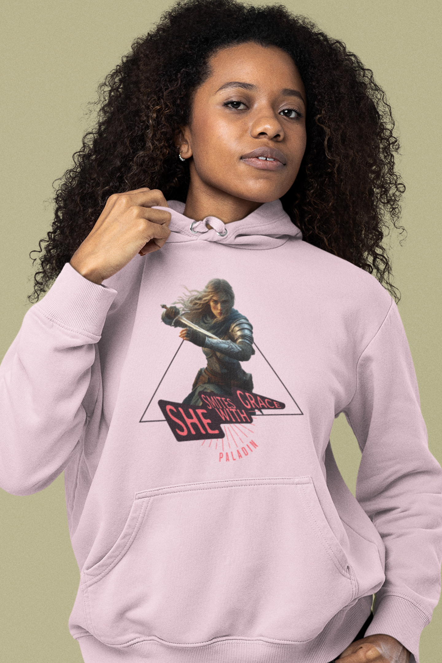 Person-wearing-a-white-hoodie-with female-paladin-warrior-graphic-design-color-pink